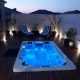 Artesian Spas Island Bimini Large Hot Tub at Night